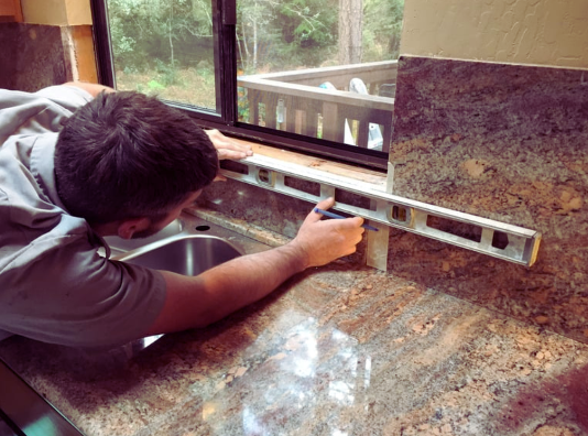 Experienced staff installing new granite countertops Hutchinson Kansas