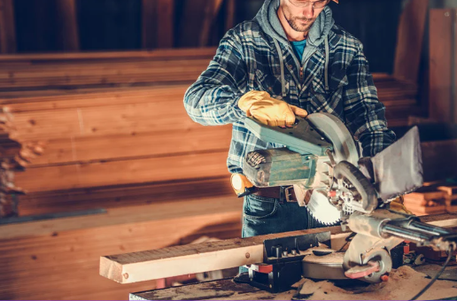 deck repair man cutting wood for deck in Hutchinson Kansas